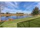 Scenic lake view from backyard at 4923 Lawler Loop, The Villages, FL 32163