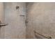 Large walk-in shower with grab bar and tile surround at 4923 Lawler Loop, The Villages, FL 32163