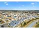 Aerial view of home and surrounding houses at 5415 Kate Ct, The Villages, FL 32163