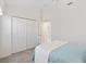 Cozy bedroom with a double bed and built-in closet at 5676 Patterson Loop, The Villages, FL 32163