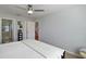 Spacious bedroom with ensuite bathroom access and neutral decor at 586 Juniper Way, Tavares, FL 32778