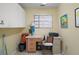 Home office with desk, cabinets, and printer at 586 Juniper Way, Tavares, FL 32778