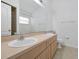 Bathroom with double sinks and a shower at 7872 Niagara Falls Ct, Orlando, FL 32825