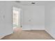 Bedroom with access to bathroom and neutral decor at 7872 Niagara Falls Ct, Orlando, FL 32825