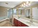 Bathroom features double vanity and corner soaking tub at 791 Princeton Dr, Clermont, FL 34711