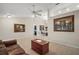 Living area with a brown leather couch and wood coffee table at 791 Princeton Dr, Clermont, FL 34711