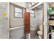 Small bathroom with toilet and storage at 807 Maple Ln, The Villages, FL 32159