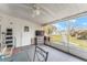 Relaxing screened porch overlooking backyard at 807 Maple Ln, The Villages, FL 32159