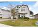 Two story house with stone accents at 848 Carmillion Ct, Groveland, FL 34736