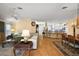 Elegant dining room with hardwood floors and a chandelier at 848 Folsum Pl, The Villages, FL 32162