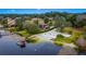 Aerial view showing house, lake access, and gazebo at 9605 Hollyglen Pl, Windermere, FL 34786