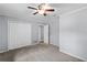 Bedroom with gray walls, carpet, and ceiling fan at 9605 Hollyglen Pl, Windermere, FL 34786