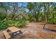 Wooden picnic table in a shaded community area at 9605 Hollyglen Pl, Windermere, FL 34786