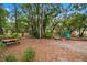 Picnic table near playground and play area at 9605 Hollyglen Pl, Windermere, FL 34786