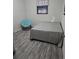 Simple bedroom design features light gray vinyl flooring and a comfortable layout at 10094 Sw 153Rd Ln, Dunnellon, FL 34432