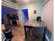 Small dining area adjacent to kitchen with granite top table at 1017 Willow Dr, Leesburg, FL 34748