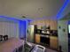 Modern kitchen with stainless steel appliances and wood cabinets at 1017 Willow Dr, Leesburg, FL 34748