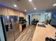 Modern kitchen with stainless steel appliances and ample counter space at 1017 Willow Dr, Leesburg, FL 34748