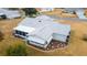 Aerial view highlighting the home's rear and screened porch at 10476 Se 178Th St, Summerfield, FL 34491