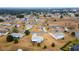 Aerial view of a single Gathering home in a residential neighborhood at 10476 Se 178Th St, Summerfield, FL 34491