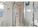 Bathroom with shower stall and tiled floor at 10476 Se 178Th St, Summerfield, FL 34491