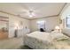 Bedroom with carpeted floor, double bed, and built-in desk at 10476 Se 178Th St, Summerfield, FL 34491