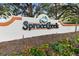 Spruce Creek community entrance sign with landscaping at 10476 Se 178Th St, Summerfield, FL 34491