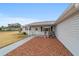 House front entry with walkway and small porch at 10476 Se 178Th St, Summerfield, FL 34491