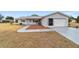 Well-maintained house with a landscaped front yard at 10476 Se 178Th St, Summerfield, FL 34491