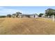 Single-story house with a large front yard at 10476 Se 178Th St, Summerfield, FL 34491