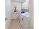 Laundry room with washer, dryer, and exterior access at 10476 Se 178Th St, Summerfield, FL 34491