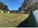Spacious backyard with large trees and fence at 1220 Beulah Rd, Winter Garden, FL 34787