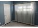 Bright bedroom with light walls and window curtains at 1220 Beulah Rd, Winter Garden, FL 34787