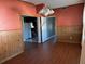 Simple dining room with wood paneling and hardwood floor at 1220 Beulah Rd, Winter Garden, FL 34787