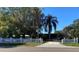 Home with a long driveway and white picket fence at 1220 Beulah Rd, Winter Garden, FL 34787