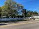 House with white picket fence and palm trees at 1220 Beulah Rd, Winter Garden, FL 34787