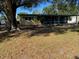 Ranch-style home with covered porch and mature landscaping at 1220 Beulah Rd, Winter Garden, FL 34787
