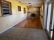 Living room with tile and hardwood floors and stone fireplace at 1220 Beulah Rd, Winter Garden, FL 34787