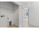 Shared laundry closet with access to bedroom at 13329 Harbor Shore Ln, Winter Garden, FL 34787