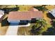 Single-story house with a two-car garage, seen from above at 13709 Se 89Th Ave, Summerfield, FL 34491