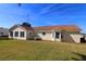 Spacious backyard with patio and bird bath at 13709 Se 89Th Ave, Summerfield, FL 34491