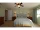 Serene bedroom with ceiling fan and ample closet space at 13709 Se 89Th Ave, Summerfield, FL 34491