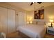Bedroom with double bed, artwork, and built in closet at 13709 Se 89Th Ave, Summerfield, FL 34491