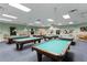 Game room with multiple billiard tables at 13709 Se 89Th Ave, Summerfield, FL 34491