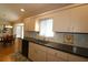 Bright kitchen featuring white subway tile backsplash and hardwood floors at 13709 Se 89Th Ave, Summerfield, FL 34491
