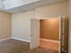 Spacious bedroom with an adjacent room and carpet flooring at 1515 Gadsden Pl, The Villages, FL 32162