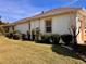 Well maintained house exterior with manicured lawn at 1515 Gadsden Pl, The Villages, FL 32162