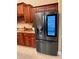 Sleek stainless steel refrigerator in a well-equipped kitchen at 1515 Gadsden Pl, The Villages, FL 32162