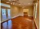 Large main bedroom with hardwood floors, high ceilings and two ceiling fans at 1515 Gadsden Pl, The Villages, FL 32162