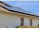 Home with solar panels installed on the roof at 1515 Gadsden Pl, The Villages, FL 32162